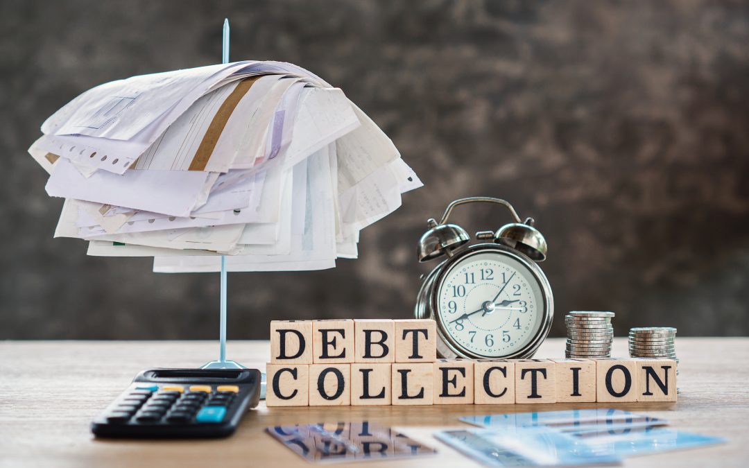 debt collections spelt out on a desk