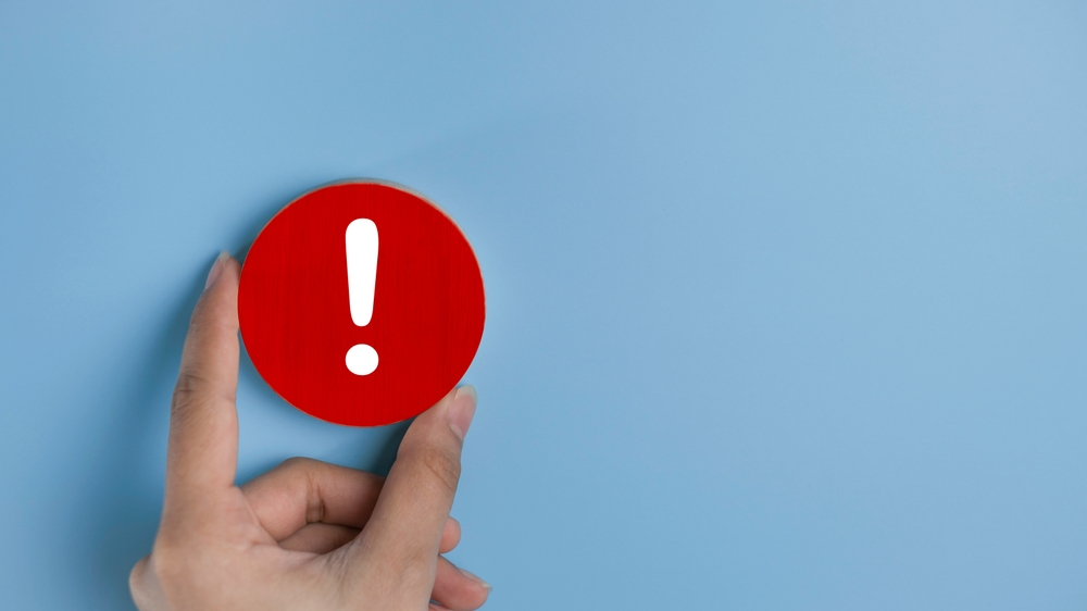 A red caution button