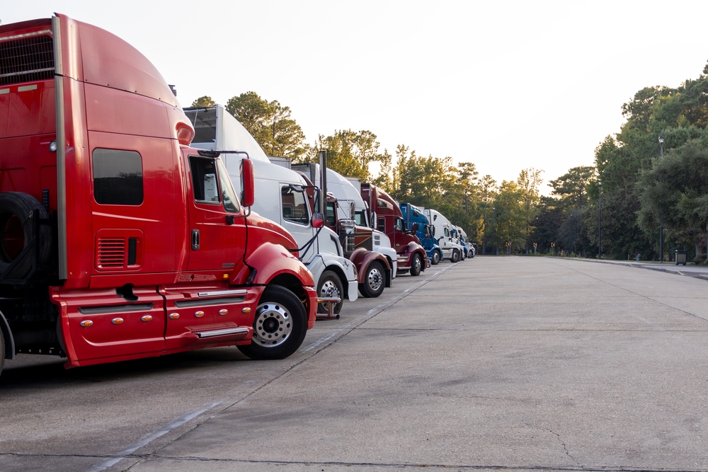 California trucks lined up for port drayage at dusk